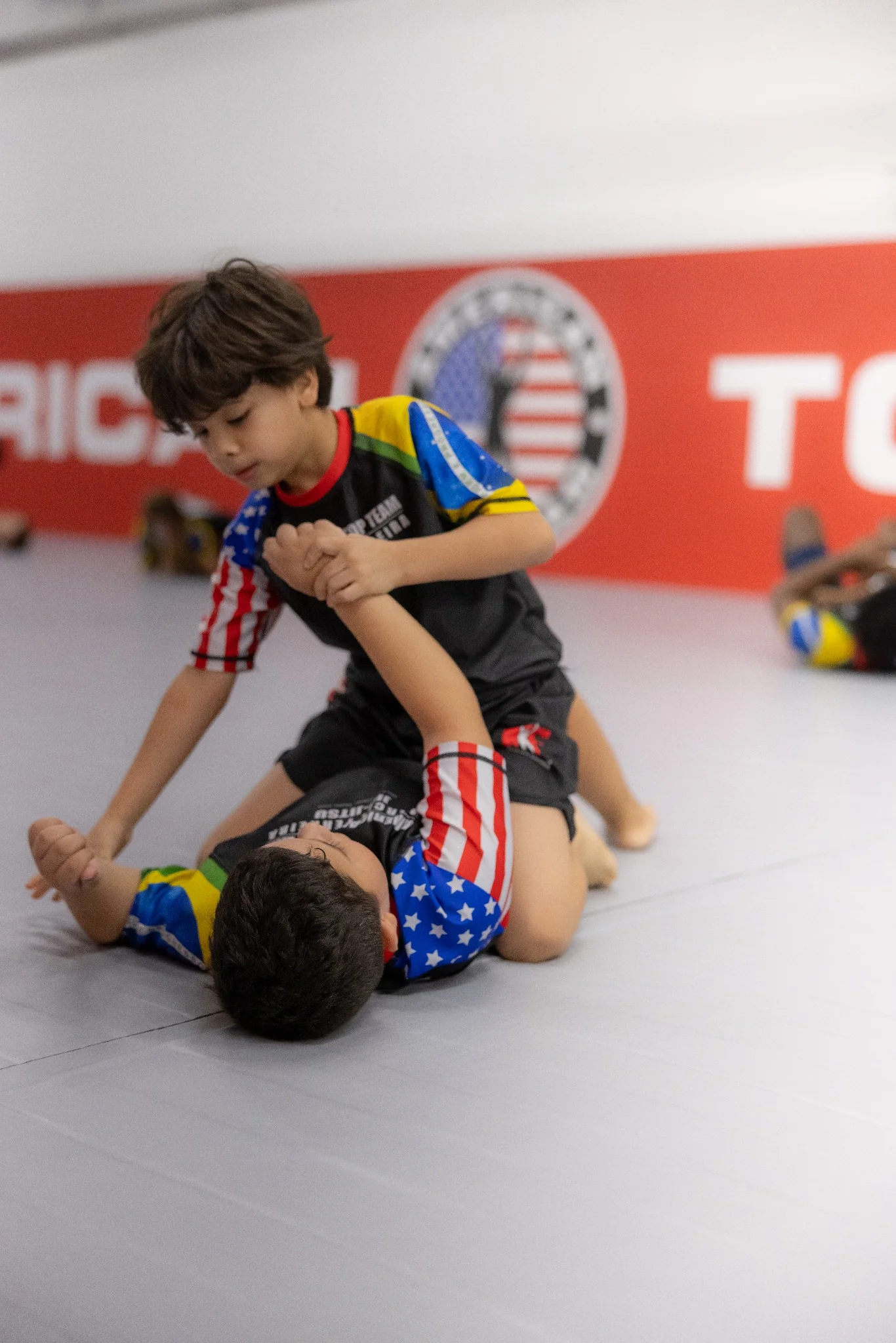 Students rolling on the mats at ATT Winter Garden