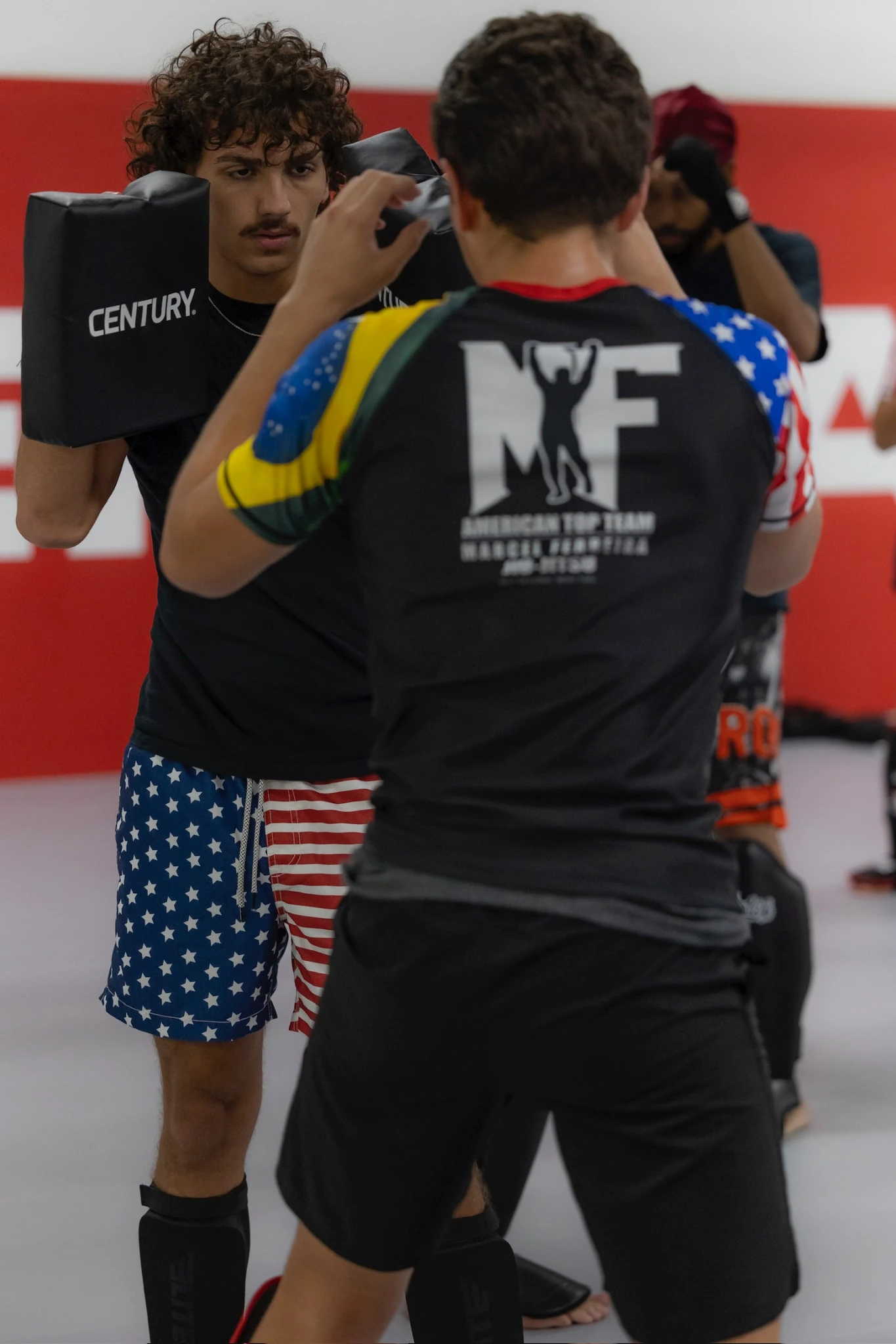 Striking technique drill during a Muay Thai class at ATT Winter Garden